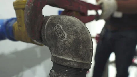 Asian engineer working in the boiler room Stock Footage 248237049