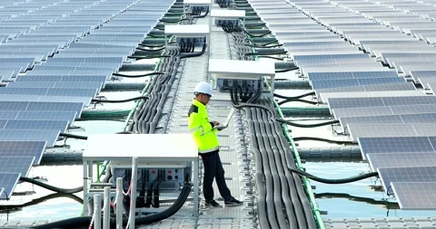 Asian engineer working at Floating solar farm-13 Stock Footage 205897204