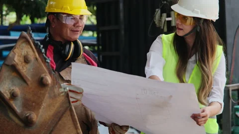 Asian engineering manager and mechanic worker working in factory. Stock Footage 185364381