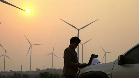 Asian engineers are checking the wind turbine system with a tablet 스톡 동영상 105472715