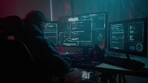 Asian expert prescribing malware code on modern computer Stock Footage 257381111