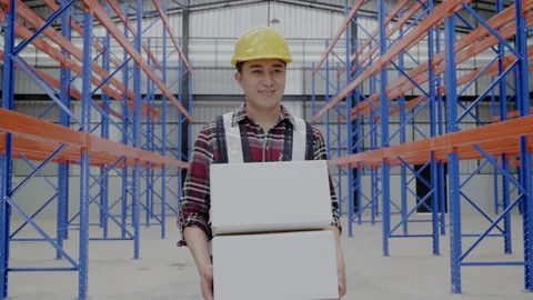 Asian Factory worker in warehouse work to move cartons to customers Stock Footage 154592163