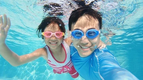 Asian Family Swimming Stock Video Footage 