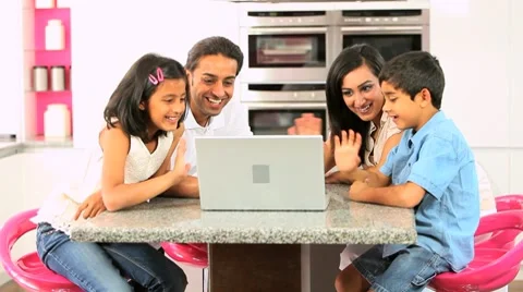 Asian Family Using Laptop for Online Video Chat Stock Footage