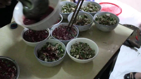 Asian farmers working in the kitchen, making traditional dishes Stock Footage 46457736
