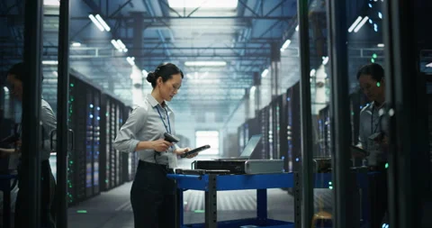 Asian Female Administrator Working in Data Center Stock Footage 319999113