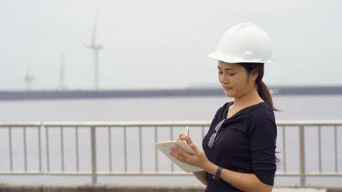 Asian female engineer checking the work. Stock Footage 92395813
