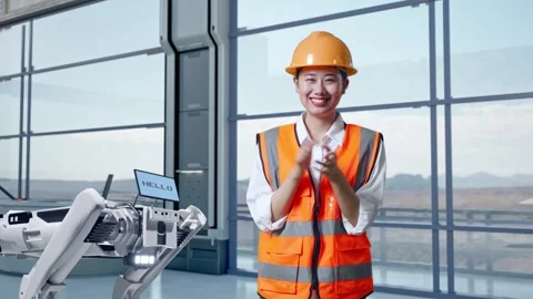 Asian Female Engineer Smiling And Clapping Her Hands In High Tech Factory Stock Footage 274539218