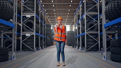 Asian Female Engineer Smiling Touching Her Chest Pointing At You Tire Warehouse Stock Footage 341789694