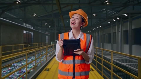 Asian Female Engineer Taking Note On The Tablet, Plastic Recycling Factory Stock Footage 315154604