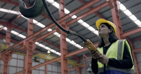 Asian female engineer using machine control tools factory. Stock Footage 308170416