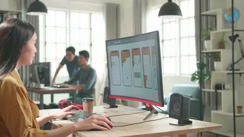 Asian Female Mobile Application Developer Works And Using Mobile Phone Stock Footage 158097067