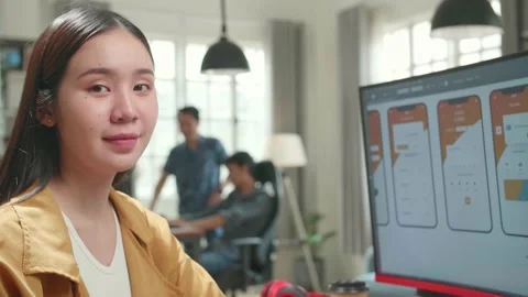 Asian Female Mobile Application Developer Works With Graphics On Her Personal Stock Footage 158103004