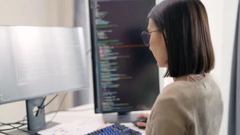 Asian Female Programmer Working on Code in Modern Office. Stock Footage 300246065