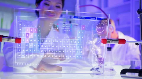 Asian female scientist using touchscreen technology for analysis in laboratory Stock Footage 54565013
