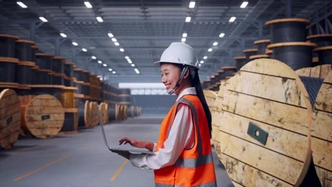 Asian Female Use Computer While Walking With Cable Coils Stock Footage 323919638