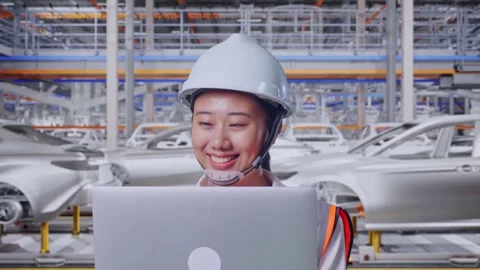 Asian Female Use Computer While Walking In Car Factory Stock Footage 331629908