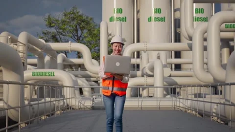 Asian Female Use Computer While Walking at Energy Plant Stock Footage 331637885