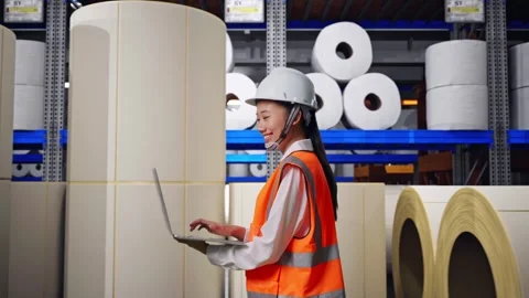 Asian Female Use Computer While Walking at Polymer Plant Stock Footage 334519364