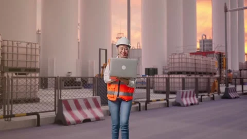 Asian Female Use Computer While Walking at Storage Facility Stock Footage 335074585