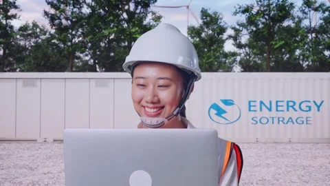 Asian Female Use Computer While Walking with Energy Storage Stock Footage 337810917