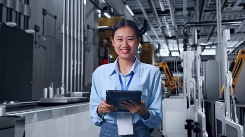 Asian Female Worker Use Tablet And Smiling To Camera, Battery Factory Stock Footage 314933549