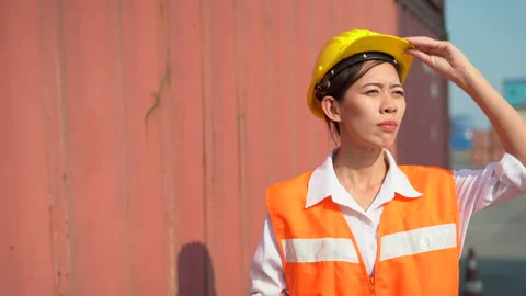 Asian foreman woman using  tablet computer walking to checking and control lo Stock Footage 157715176