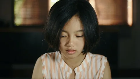 Asian girl using computer laptop at home for education. Stock Footage 99889525
