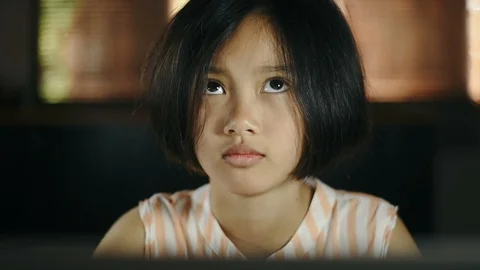 Asian girl using computer laptop at home for education. Stock Footage 99890425