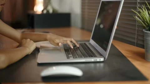Asian girl using computer laptop at home for education. Stock Footage 99945096