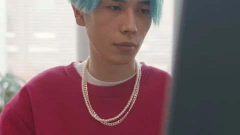 Asian Guy Programming on Computer in Office Stock Footage 241264596