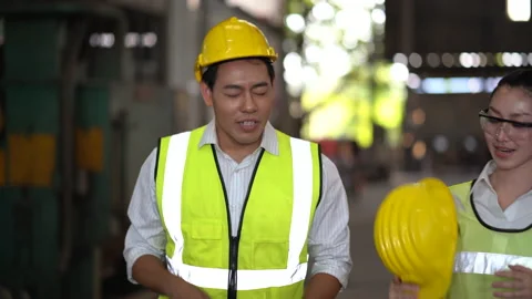 Asian industrial Engineer man talking with worker woman take a break during w Stock Footage 154487778