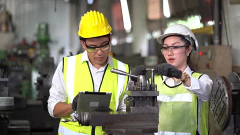 Asian industrial Engineer manager man demonstration and training mechanic wor Stock Footage 154485309