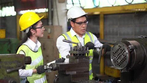 Asian industrial Engineer manager man demonstration and training mechanic wor Stock Footage 154485734