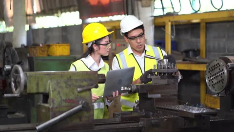Asian industrial Engineer manager man and training mechanic worker woman op.. Stock Footage 246107904