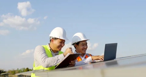 Asian Inspector Engineer man Holding checking board and young specialist man  Stock Footage 197755124