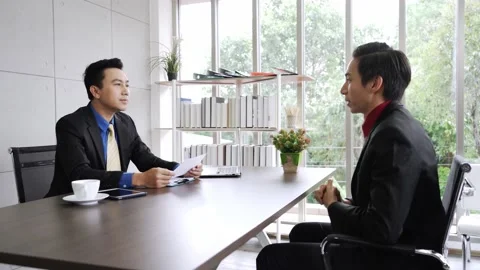 Asian jobless applicant candidate in  interview with hiring company manager Video stock 135569514