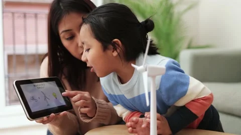 Asian kid learning about alternative renewable energy at kindergarten school cla Stock Footage 170249383