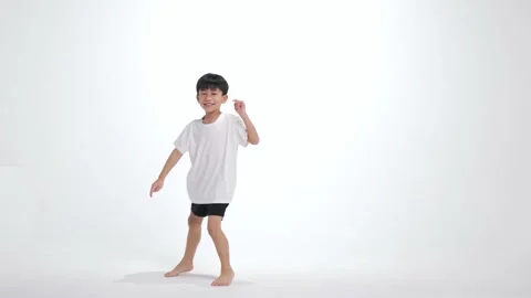 Asian kid practice dancing on the white screen. Stock Footage 197365656
