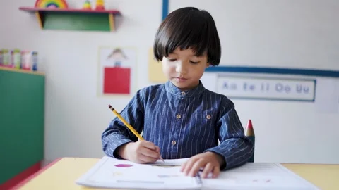 Asian kid at school learning and studying in kindergarten Education concept Stock Footage 307166461