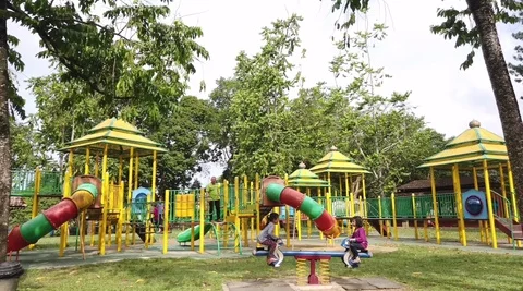 Asian kids having fun playing at the playground Stock Footage 121405853