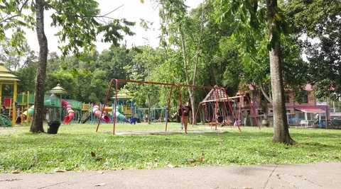 Asian kids having fun playing at the playground Stock Footage 121405866