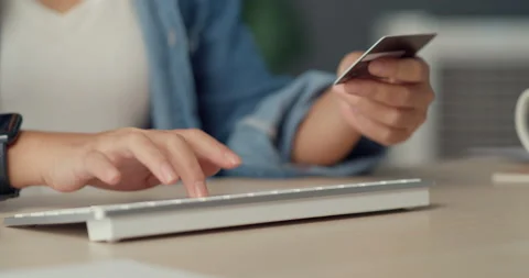 Asian lady using computer order online shopping product and paying bill. Stockbeeldmateriaal 154013993
