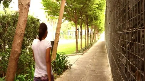 Asian lady walking pass the camera Stock Footage 46099563