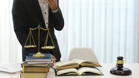 Asian lawyer prepare documents on the table in a lawyer's office. Stock Footage 107874603
