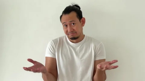 Asian ma doing disappointed face at the camera as the problem can not be solved. Stock Footage 296758652