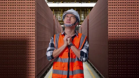 Asian Male Engineer Pray For Something With Brick In Stacks Stock Footage 303759708