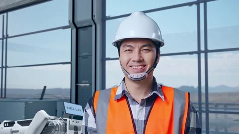 Asian Male Engineer Smiling To Camera in High Tech Factory Stock Footage 274359458