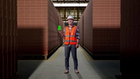 Asian Male Engineer Using Smartphone With Brick In Stacks Stock Footage 303761228