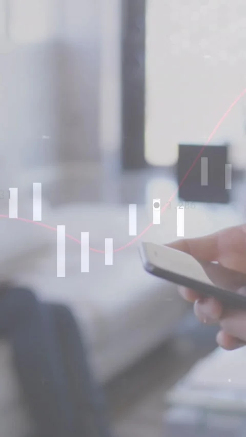 An asian male executive is using a mobile phone in a modern office Stock Footage 344723204